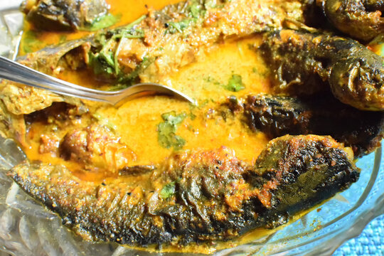 Tyangra fish , scientific name - Batasio batasio or Mystus tengara or Macrones vittalus, cooked and served in plate. These are very popular fishes in West Bengal (India). Bengalis love to eat them.