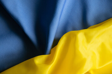 Yellow-blue national flag of Ukraine as a background, stop war and peace in Ukraine