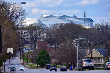 Atlanta neighborhood with light traffic and a sports stadium 