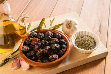 Still life with a bowl of olives.