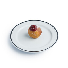 Dessert cake on a color plate. Top view. Copy space. isolated on white