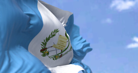 Detail of the national flag of Guatemala waving in the wind on a clear day