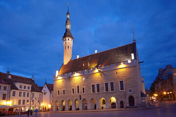 The Town Hall of Tallinn illuminated at dusk, this gothic style building dates from 1402-04