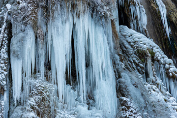 Fototapeta na wymiar Frozen waterfall in the winter