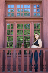 Young woman seven months pregnant