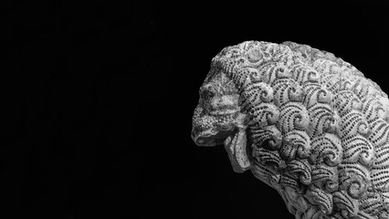 Medieval ferocius lion statue, in the the Lucca old walls public park (Black and White with copy...