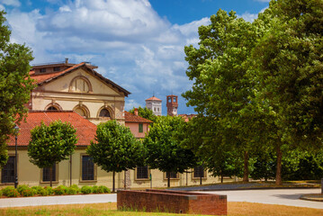 View of Lucca historical center with medieval towers from the walls public park