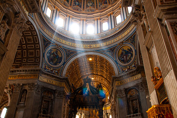 Fototapeta premium Sunlight peaking through the interior of the Vatican Italy