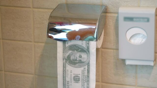 Using dollar toilet paper in 4k slow motion 60fps