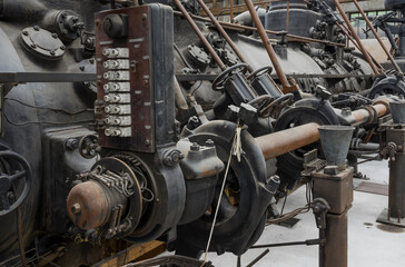 Detail of a historic stationary steam engine.
