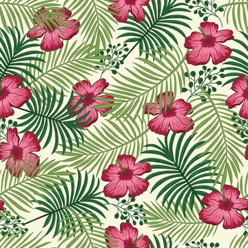 Tropical floral colorful seamless pattern with beautiful flowers green palm leaves vector © nataliakarebina