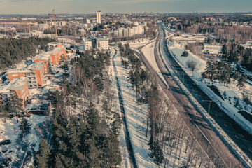 Aerial view of the highway and intersection in the city on a winter day