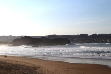 View of a large beach at sunset