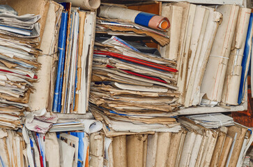 Old paper documents on the shelves © Todayphoto