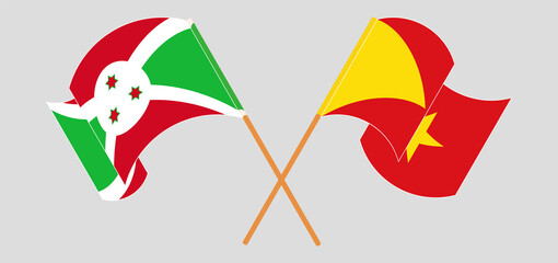 Crossed and waving flags of Burundi and Tigray