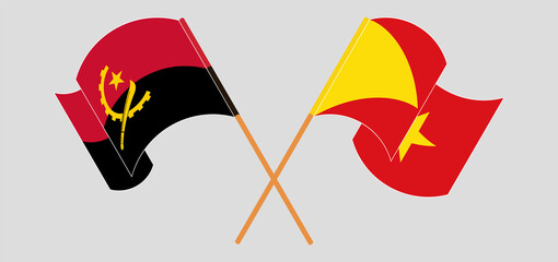 Crossed and waving flags of Angola and Tigray