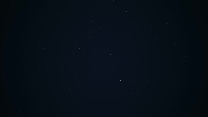 A twinkling starry night sky background