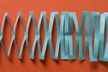 cut paper on orange