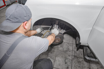 Brake system of car, Closeup disc brake of the vehicle for repair in garage.
