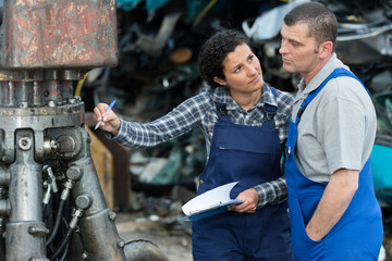 engineers working on machines