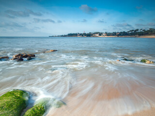 Ocean waves and sandy beach on Atlantic coast of Charente Maritime, France near La Rochelle
