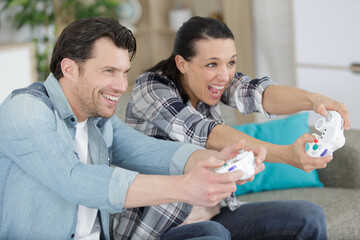 couple having fun playing video games