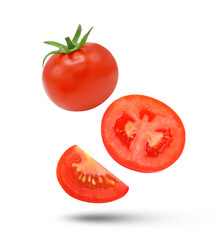 Whole, sliced tomato falling in the air isolated on white background.