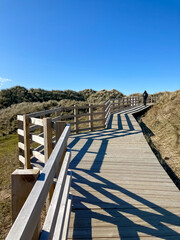 Wooden footpath in the dunes. Wales. 