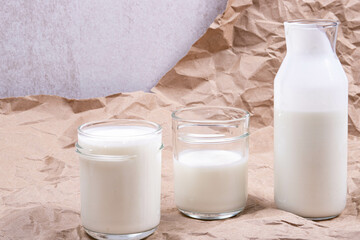 Three serving of yogurt on a paper background