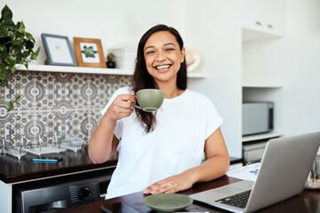 I cant get started without coffee. Portrait of a young woman drinking coffee while working on a laptop at home. - obrazy, fototapety, plakaty