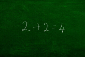 Obraz premium two plus two is foru math classrom school board learning math algebra numbers