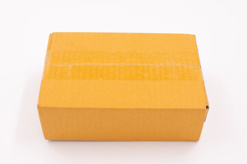 Brown cardboard boxes for packing parcels in online sales placed on a white background.