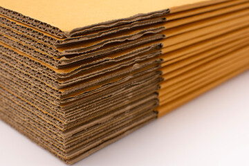 Brown cardboard boxes for packing parcels in online sales placed on a white background.