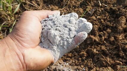 Farmers catch ashes for composting to nourish plants and vegetables they grow in organic farms.