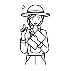 立って書類を手に持って何かひらめいた農家の女性