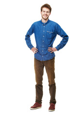 Fototapeta premium Casually handsome. A full length portrait of a happy young man isolated on white.