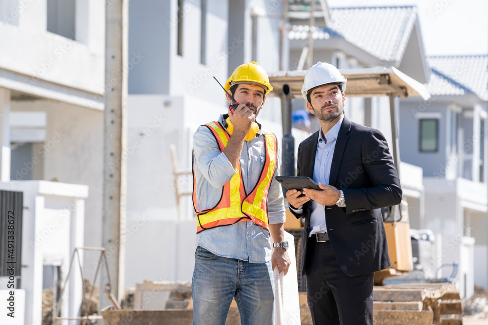 Aufkleber architect and engineer foreman discussion for plans for new home and working on a building site,home