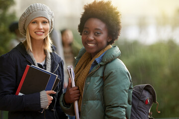 Were on our way to class. Cropped portrait of two college students on campus.