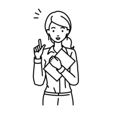 立って書類を手に持って何かひらめいたブラウスの女性