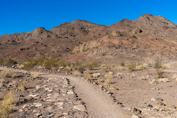 Desert hiking trail with rocks in Southern Nevada