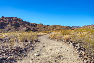 Uphill desert hiking trail in Southern Nevada
