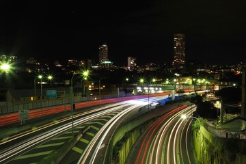 Fototapeta na wymiar Fast Cars and Bright Lights in Sydney