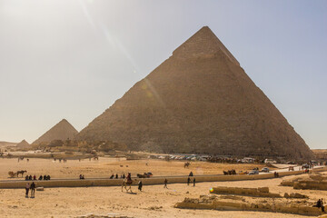 Fototapeta na wymiar CAIRO, EGYPT - JANUARY 28, 2019: People in front of pyramids in Giza, Egypt
