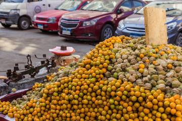 Street stall selling goldenberry (Physalis peruviana) on a street  in Alexandria, Egypt