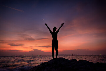 silhouette of a person in the sunset