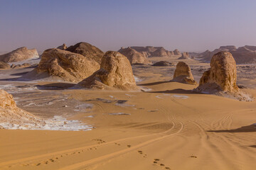 Fototapeta na wymiar Rock formations of El Aqabat (Agabat) valley in the White Desert, Egypt