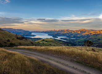 Early Autumn sunrise over Akaroa Harbour, New Zealand