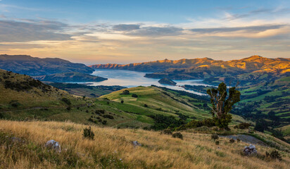 Early Autumn sunrise over Akaroa Harbour, New Zealand