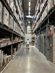a man is looking for what he wanted to shop