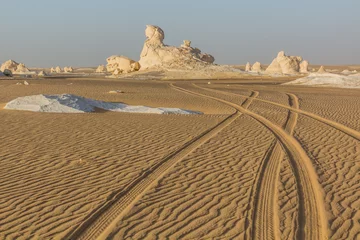 Deurstickers Car track in the White Desert, Egypt © Matyas Rehak